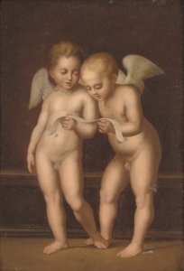 Two putti reading